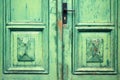 Old flaked classic green door