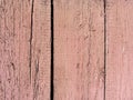 old flaked peeled weathered light red pink tone maroon brown paint curve wood planks back texture Royalty Free Stock Photo