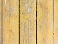 old flaked peeled weathered light yellow orange brown paint tailings wood curve planks background texture