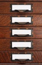 Old Flat File Drawers With Blank Labels Royalty Free Stock Photo