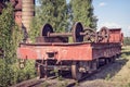 Old flat wagon with railcar wheelset Royalty Free Stock Photo
