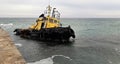 Old flooded towing ship. Shipwreck. Sunken towing ship Odessa Ukraine
