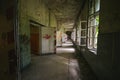 An old floor with open doors and windows in an abandoned places Royalty Free Stock Photo