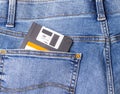 Old floppy disk in the back pocket of jeans Royalty Free Stock Photo