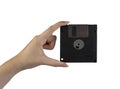 An old floppy disk in the female hand Royalty Free Stock Photo