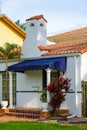 Old Florida style home barrel tile roof chimney