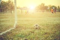 Old football Vintage photography with soccer goal with lens flare effect