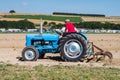 Old fordson dexter tractor ploughing
