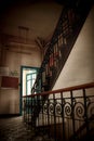 Old staircase in a abandoned decaying building in europe