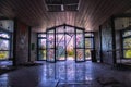 Old entrance in an abandoned decaying hospital in europe