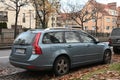 Old veteran Swedish station wagon metal blue car Volvo V50 parked