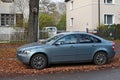 Old veteran Swedish metal blue sedan car Volvo S40 parked