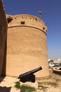 Old fort and a antique cannon outside dubai museum Royalty Free Stock Photo