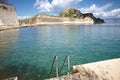 The old fortress in Corfu town with a beach stairs