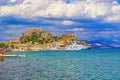 Old fortress and Luxury yachts in Corfu Town Garitsa Bay Greece Royalty Free Stock Photo
