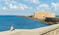 Old fortress with pigeons kissing at foreground Royalty Free Stock Photo