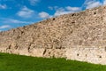 Old fortress wall made of natural stone in Izborsk, Russia. Royalty Free Stock Photo