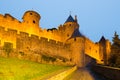 Old fortress walls in twilight time. Carcassonne Royalty Free Stock Photo