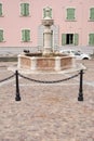 Old fountain in the center of Levico Terme , a village in the Italian Alps Royalty Free Stock Photo