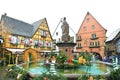 Old fountain decorated for Christmas in Eguisheim, Alsace, France Royalty Free Stock Photo