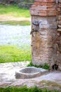 Old fountain outside a castle Royalty Free Stock Photo