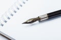 Old fountain pen with clipping path write on white paper background Royalty Free Stock Photo