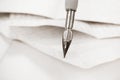 Old fountain pen on a papers background Royalty Free Stock Photo