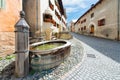 Old fountain in the Swiss Alpine village of Guarda in the Engadine valley Royalty Free Stock Photo