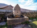 Old fountain with three pipes in the town of Monasterio de la Sierra in the autonomy of Castilla y Leon, in Spain Royalty Free Stock Photo
