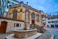 The old fountain on Zwingliplatz next to Grossmunsterkapelle, Zurich, Switzerland