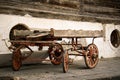 An old four-wheeled horse-drawn carriage stays abandoned. old cart carriage or horse wagon without the horse. Royalty Free Stock Photo
