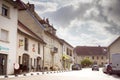 old france town with houses of burghers, small shops