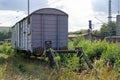 Old freight railway car on the sidetrack Royalty Free Stock Photo