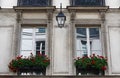 Old French house with traditional balconies and windows. Paris. Royalty Free Stock Photo