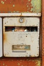 Old letterbox filled with junk mail Royalty Free Stock Photo
