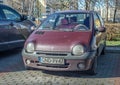 Old French small purple red car Renault Twingo front view Royalty Free Stock Photo
