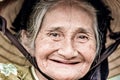 Old friendly woman with vietnamese straw hat