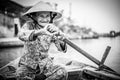 Old friendly woman with vietnamese straw hat