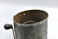 An old but functional flour sifter. Royalty Free Stock Photo