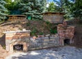 An old furnace for baking clay products in the courtyard of a pottery workshop Royalty Free Stock Photo