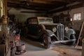 old garage with vintage car and tool bench, ready for a new owner