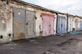 Old garages with multicolored iron gates Royalty Free Stock Photo