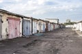 Old garages with multicolored iron gates Royalty Free Stock Photo