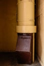 Old garbage chute in apartment building with cheap apartments - Rubbish chute in a Soviet block of flats Royalty Free Stock Photo