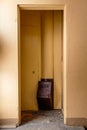 Old garbage chute in apartment building with cheap apartments - Rubbish chute in a Soviet block of flats Royalty Free Stock Photo