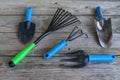 Old garden tools on an old wooden table close-up. Royalty Free Stock Photo