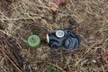 Old gas mask lies on the wilted grass after the rain. concept: biological and gas danger, the end of the world, Apocalypse, death