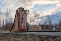 Old gas pump in the side of an old railroad