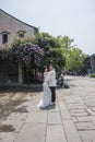 Young couple taking wedding photos in scenic area