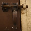 Old gate lock in abandoned jail. Royalty Free Stock Photo